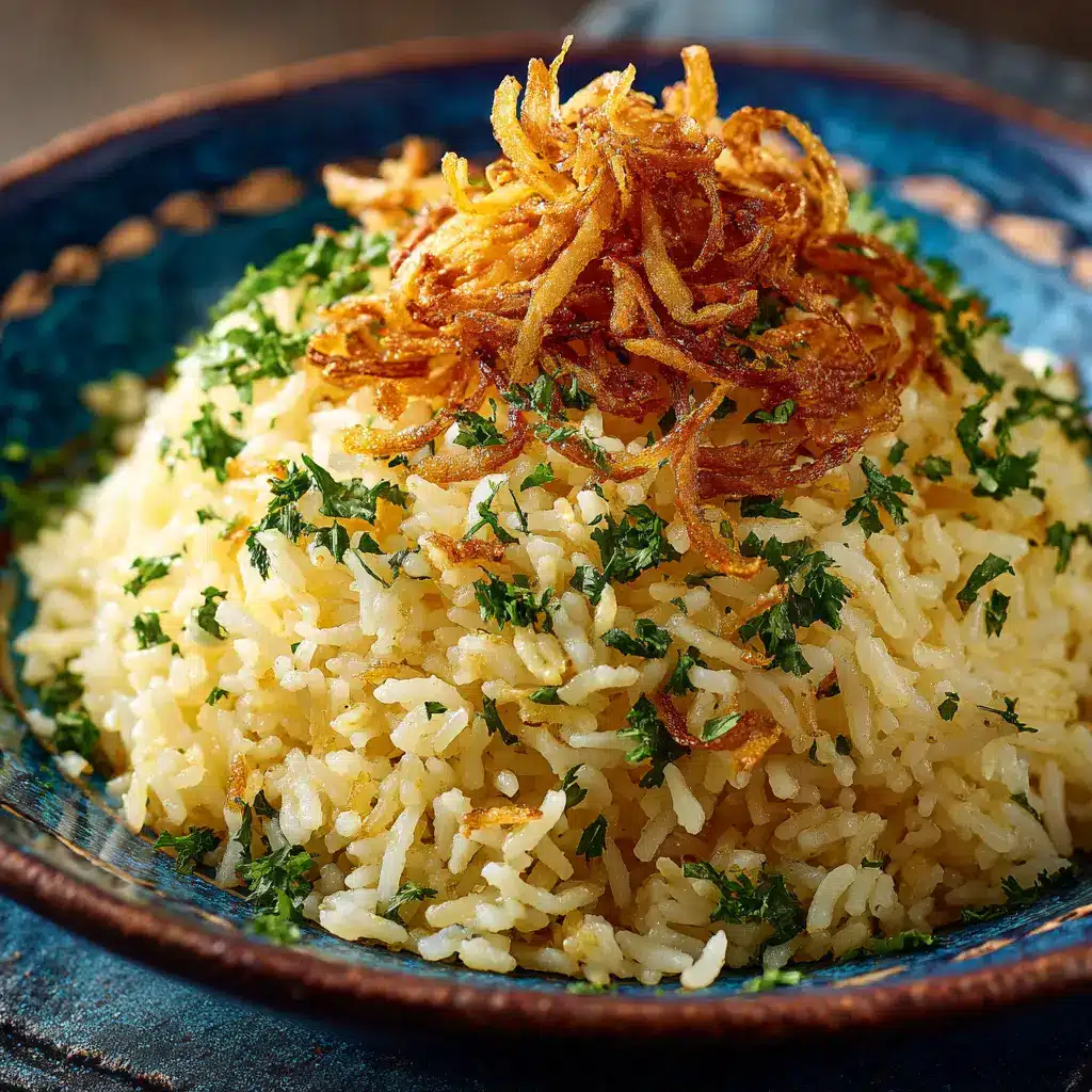 Caramelized Onion Butter Rice: The Ultimate Savory Side Dish 1 A spoonful of caramelized onion butter rice being lifted from a serving bowl, highlighting its fluffy texture.