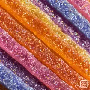 A close-up macro shot of translucent homemade boozy gummies with lime and tequila flavors, showcasing their detailed texture.