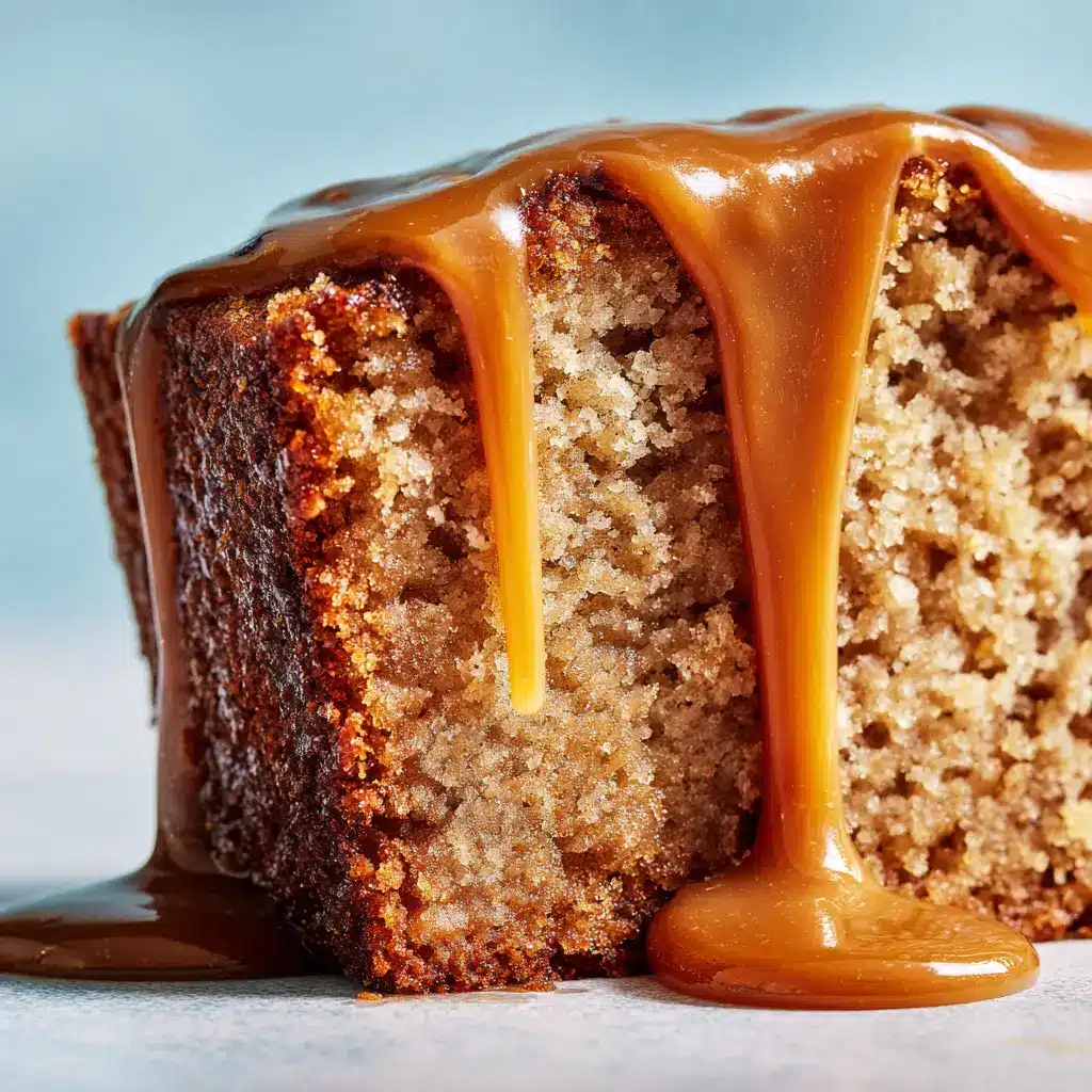 A thick slice of Brown Sugar Caramel Pound Cake on a plate, with a fork taking the first bite, emphasizing its rich and decadent qualities.