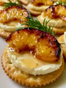 Smartphone photo showing gourmet Caramelized Peach Appetizers with golden crackers and seared fruit.